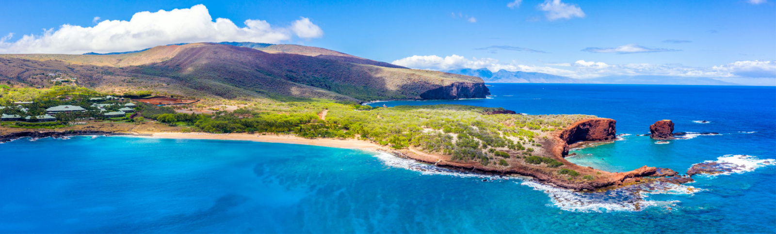 north coast coral reef for a quick and easy paddle to turtle town in low tide for experienced paddlers among rugged lava cliffs and colorful boats on the heavenly sea